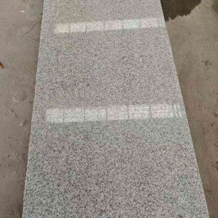 定西芝麻白光面毛板