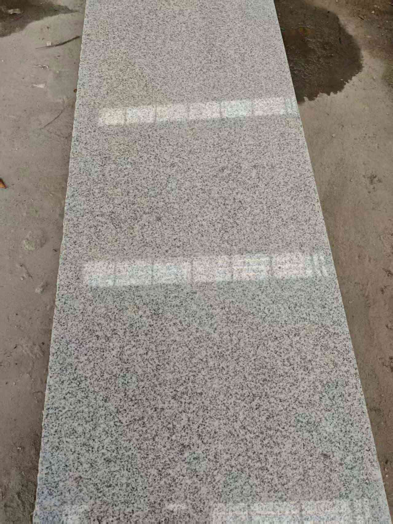 定西芝麻白光面毛板